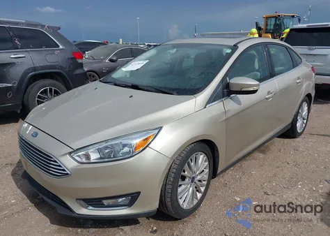 2017 Ford Focus Titanium z USA, uszkodzony, nr VIN 1FADP3J25HL267682